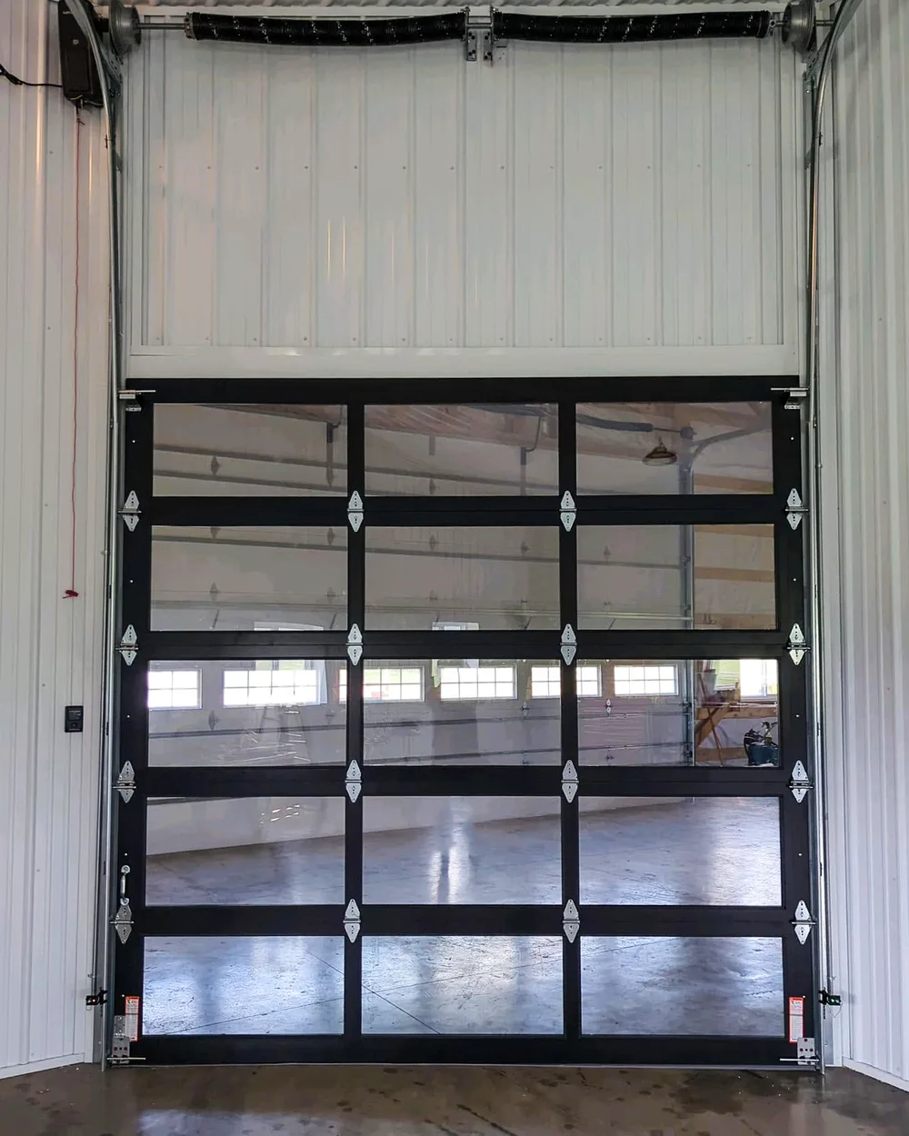 Interior view of a full-view door on a vertical-lift track