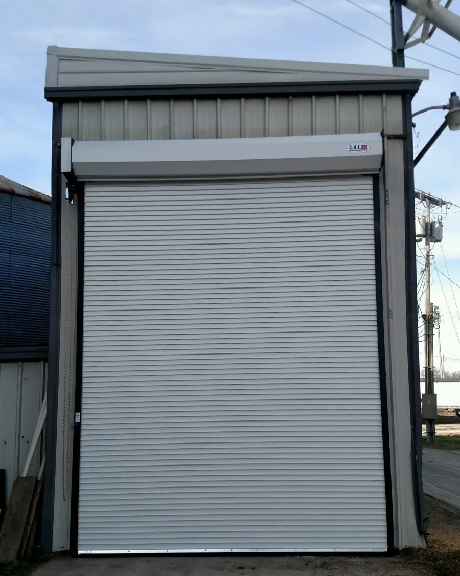 Rolling steel door installed inside an agricultural building